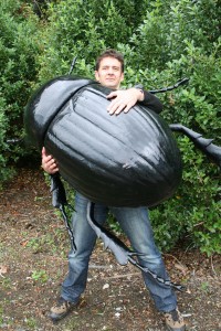 BUG OFF - Warren King, farms systems team manager at Agresearch, struggles with a giant black beetle