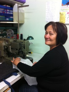 Sewing On: Dot Hunter has reopened her business after losing everything to the Samoan tsunami. Picture: Monica Tischler