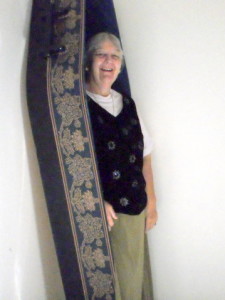 BOXED IN: Lynda Finn tries out her bespoke coffin for size