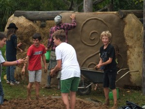 MUCKING IN: Waldorf School pupils help build a wall