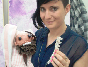 Morticia Jacobi with the toys made from possum bones.