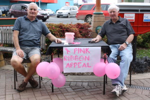 Graham Higgs and Graeme Smallwood from the Morrinsville Lions support the Pink Ribbon Appeal. Photo: Daniel Whitfield