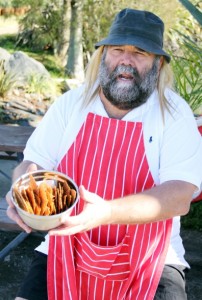 SWEET TREATS: Michael Willmoth hands out free samples to entice the crowd. Photo: Gabriella Oliver