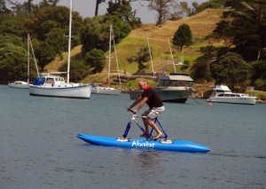 MAKING A SPLASH: Greg Gibb water-biking on his Awkakat. Photo: Supplied