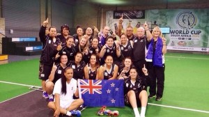 The NZ under-21 women's team celebrate success at the indoor netball world cup.
