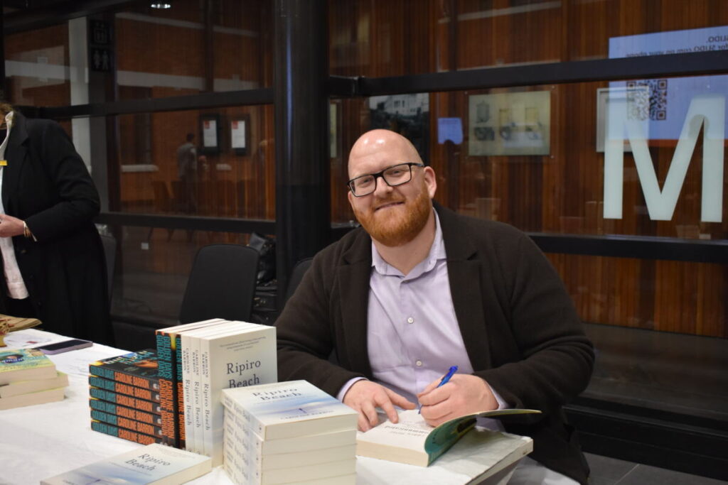 Craig Hoyle signing Excommunicated copies provided by Poppies bookstore